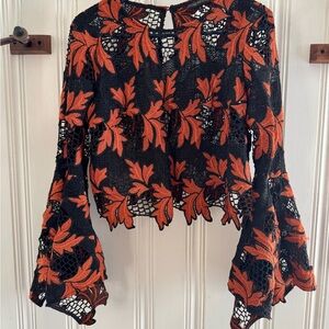 Elegant Black and Orange Lace Top